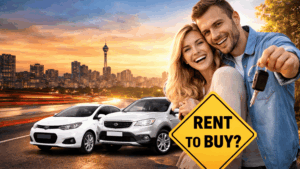 Happy couple with keys in their hands after insinuating buying a car without car finance.