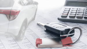 Vehicle, keys and a contract to signify the bad credit car finance blog.